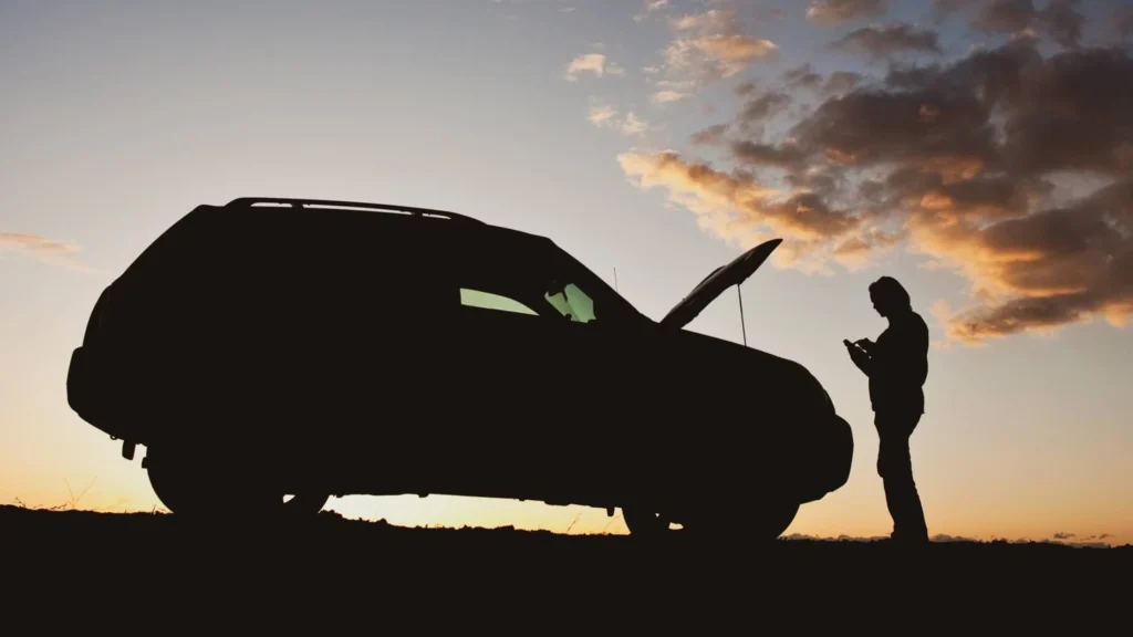 car broke down on road a woman is texting for help